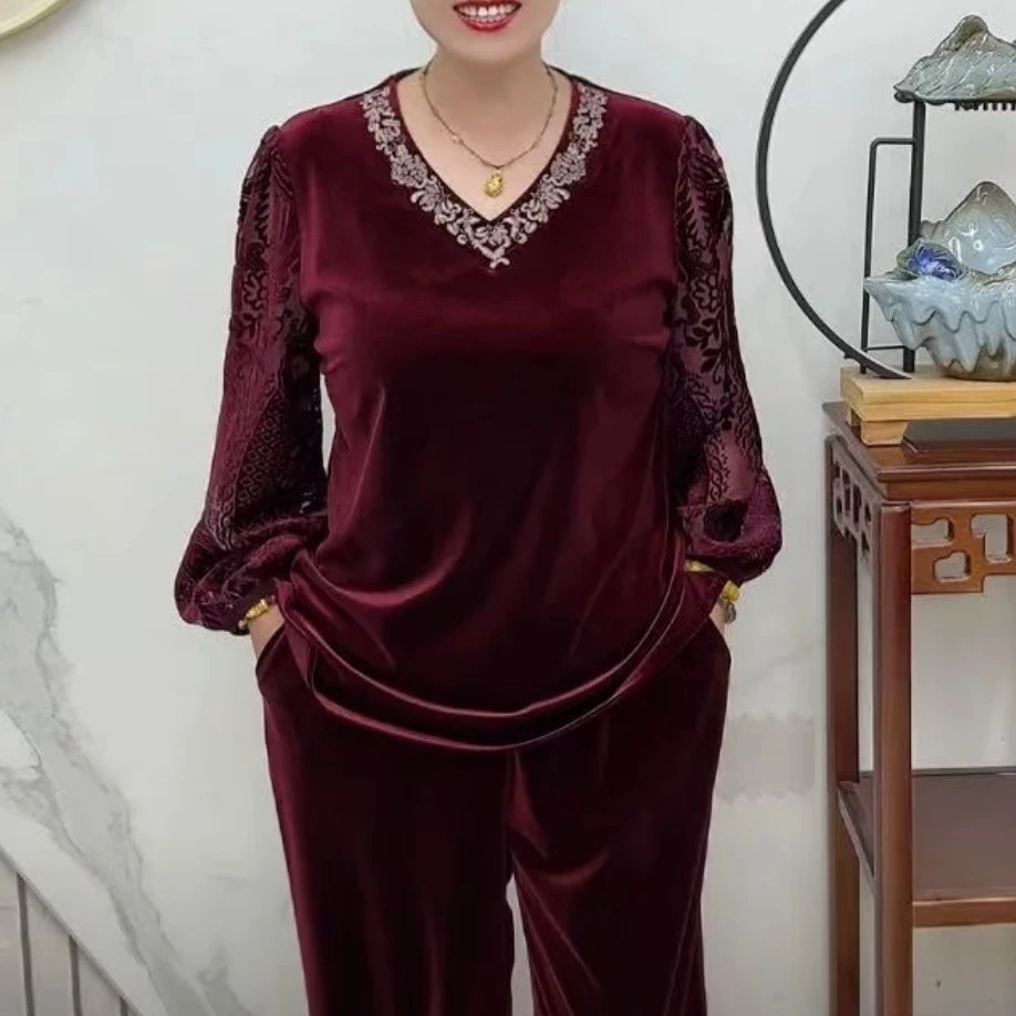 夜空黑色凤尾腰果丝绒烧花太太衫时尚套装