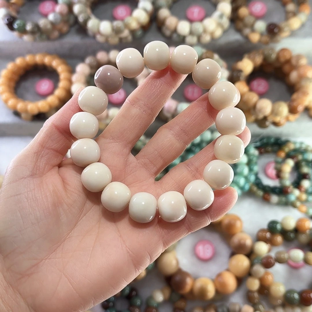 菩提根/象牙果手串琴****妞