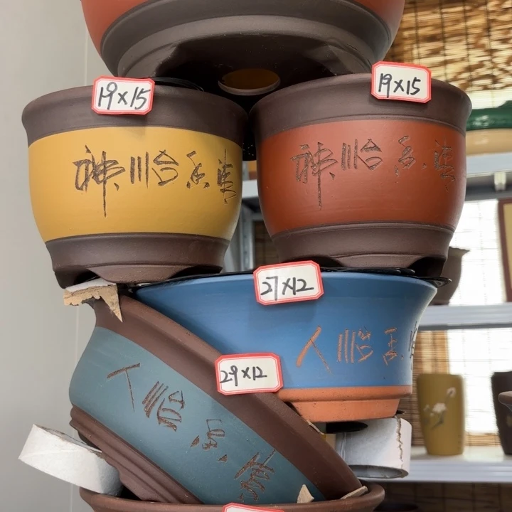 紫砂花盆100-6。