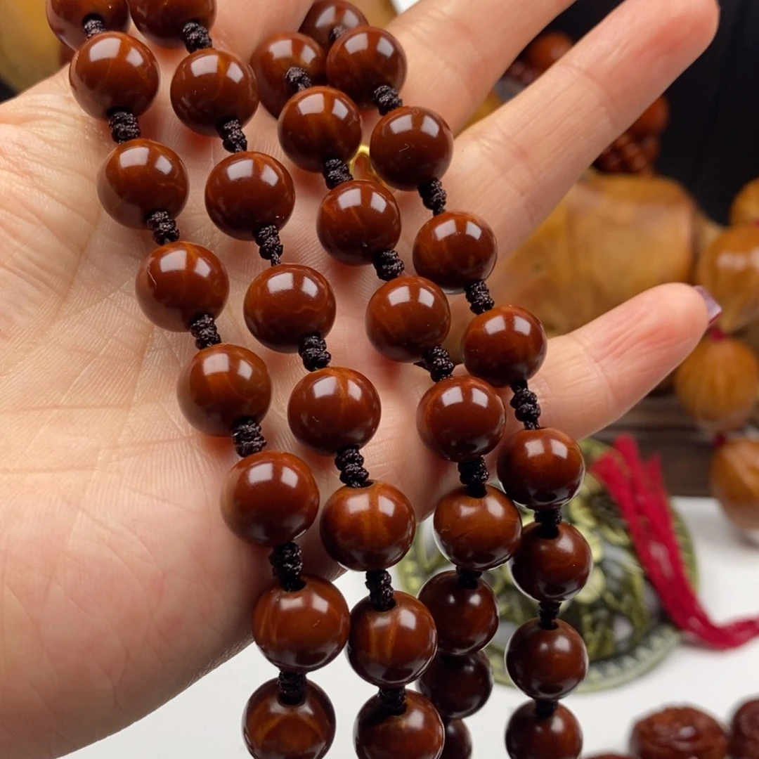 橄榄核手串钓*者我想知道