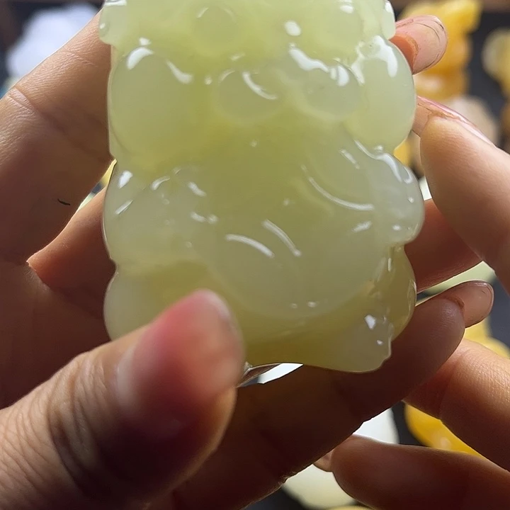 用***丽大理石磁石昆仑玉石手把件