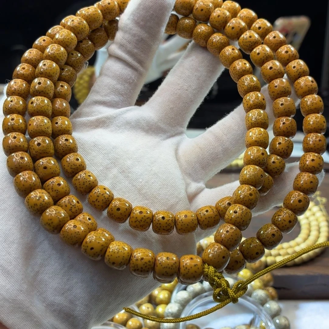 星月菩提吊坠10x9鸡油黄108