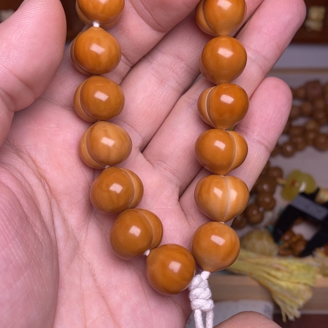 浅***依猴头核桃吊坠16➕超大尺寸高定玻璃底柯基屁桃手持