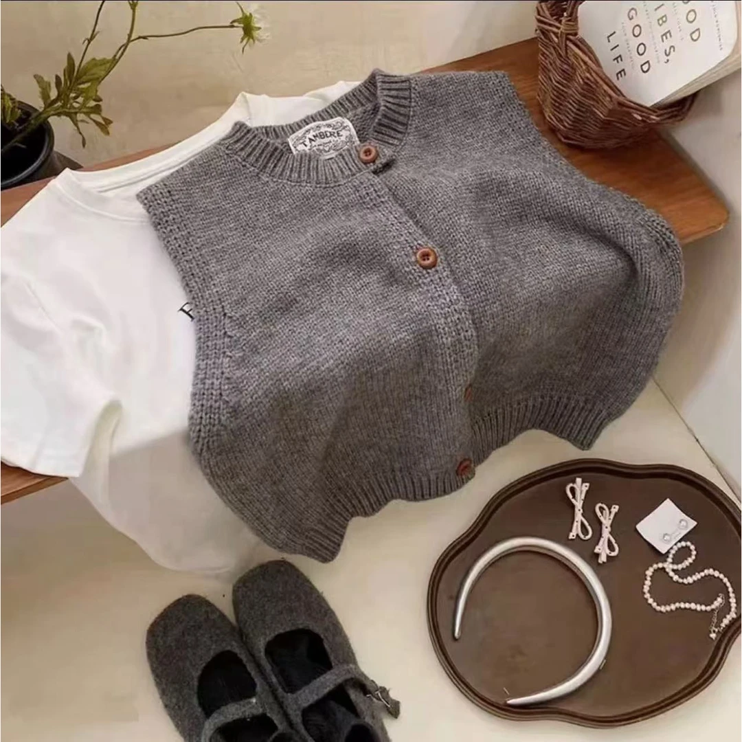 /木扣马甲/圆领纯色休闲无袖开扣马甲背心女 衣长54 88013