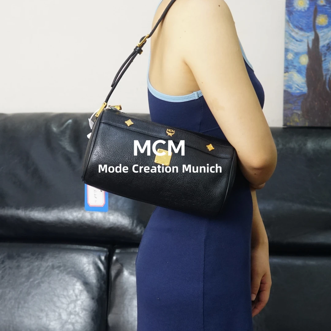 95新 MCM 黑色圆筒单肩包/WJ06327009/7009