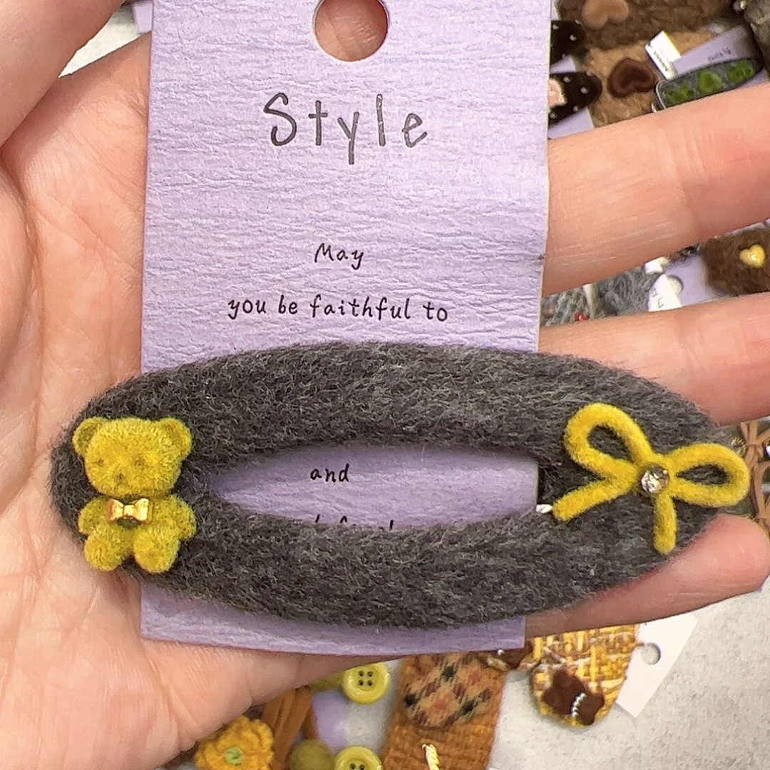 布艺非金属蝴蝶结小熊拜拜夹