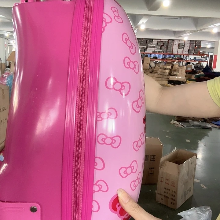 黄牛皮（革）粉色超多蝴蝶结猫猫蛋形行李箱瑕疵