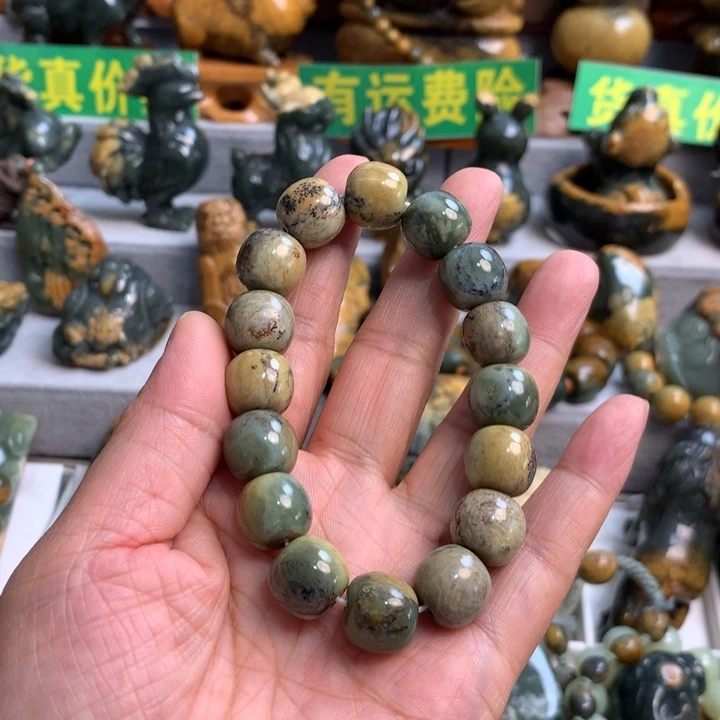 岫岩河磨玉（透闪石质玉）手把件未镶嵌一***阳