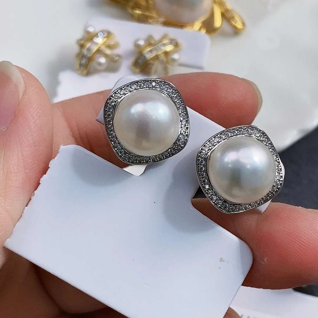 银S925镶嵌特价耳饰淡水珍珠蒲*英