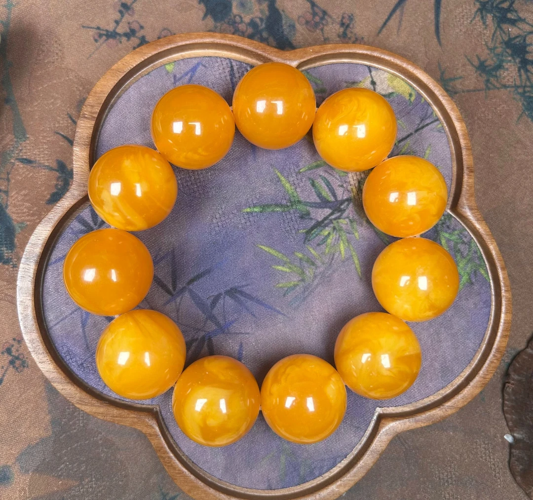 W0055波罗的海鸡油红金密彩韵手串