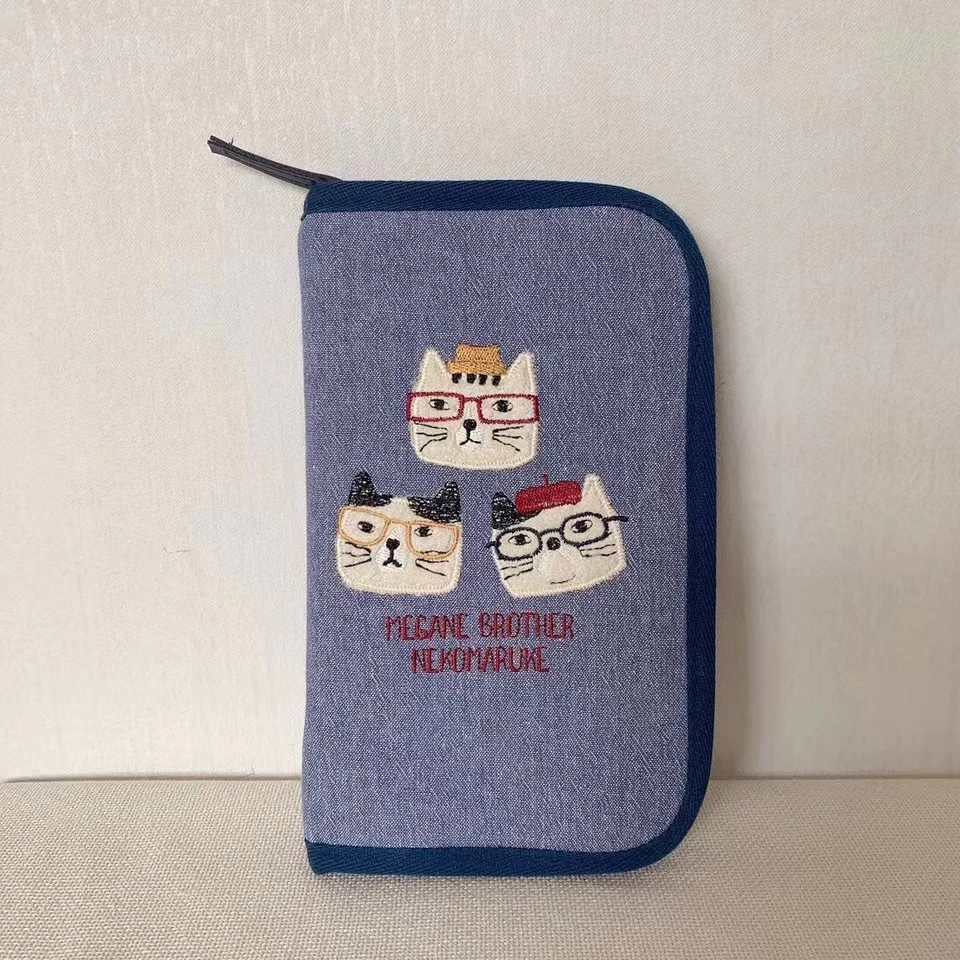 XB791 蓝色刺绣眼镜猫手拿包
