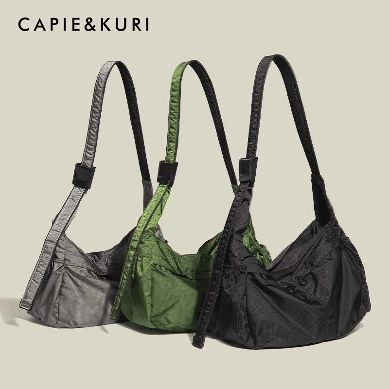 日系单肩包潮流休闲斜挎包男女学生挎包运动邮差包大容量旅行背包