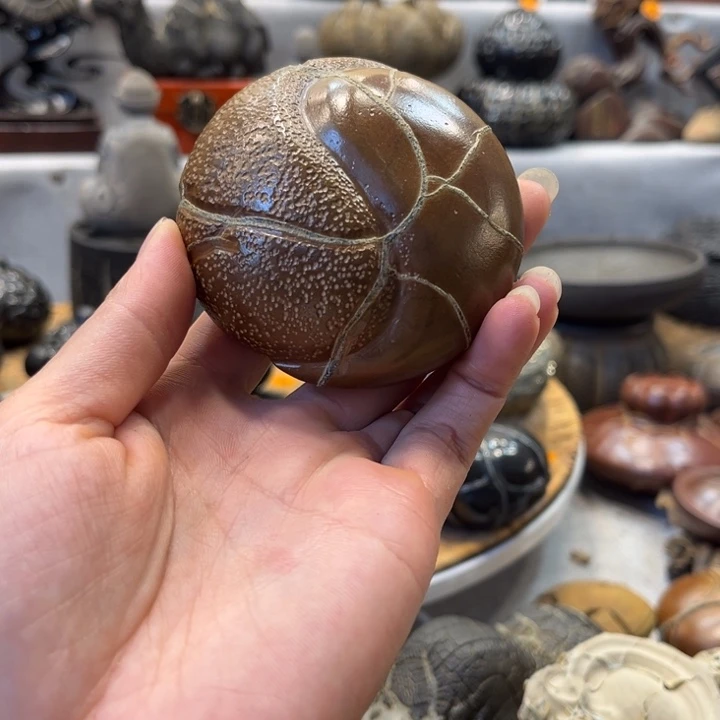 石材d****e龟纹石精品手把件