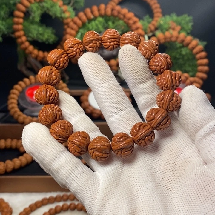 桃核吊坠林****发秦岭龙纹