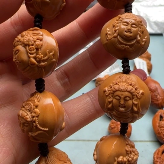 桃核吊坠橄榄雕工艺品