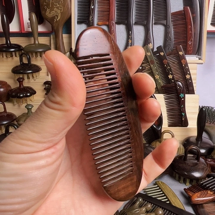 红酸枝木类红木蛋蛋梳子
