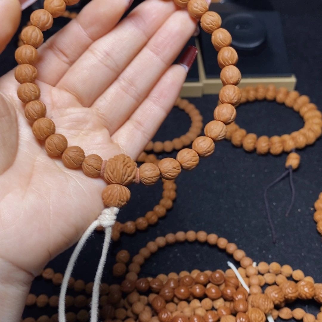 李***李桃核吊坠秦岭文玩