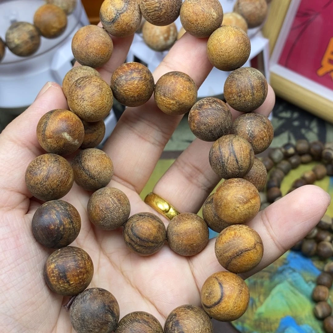 贡木泥*贡木手串微瑕打三通