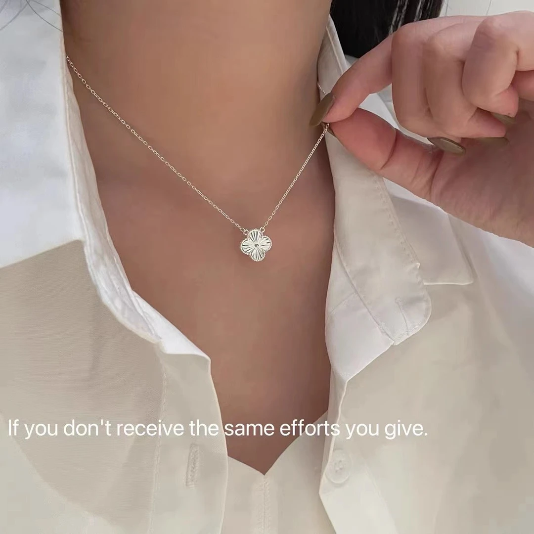 坠链均足银 990爆闪镭射车花幸运草项链