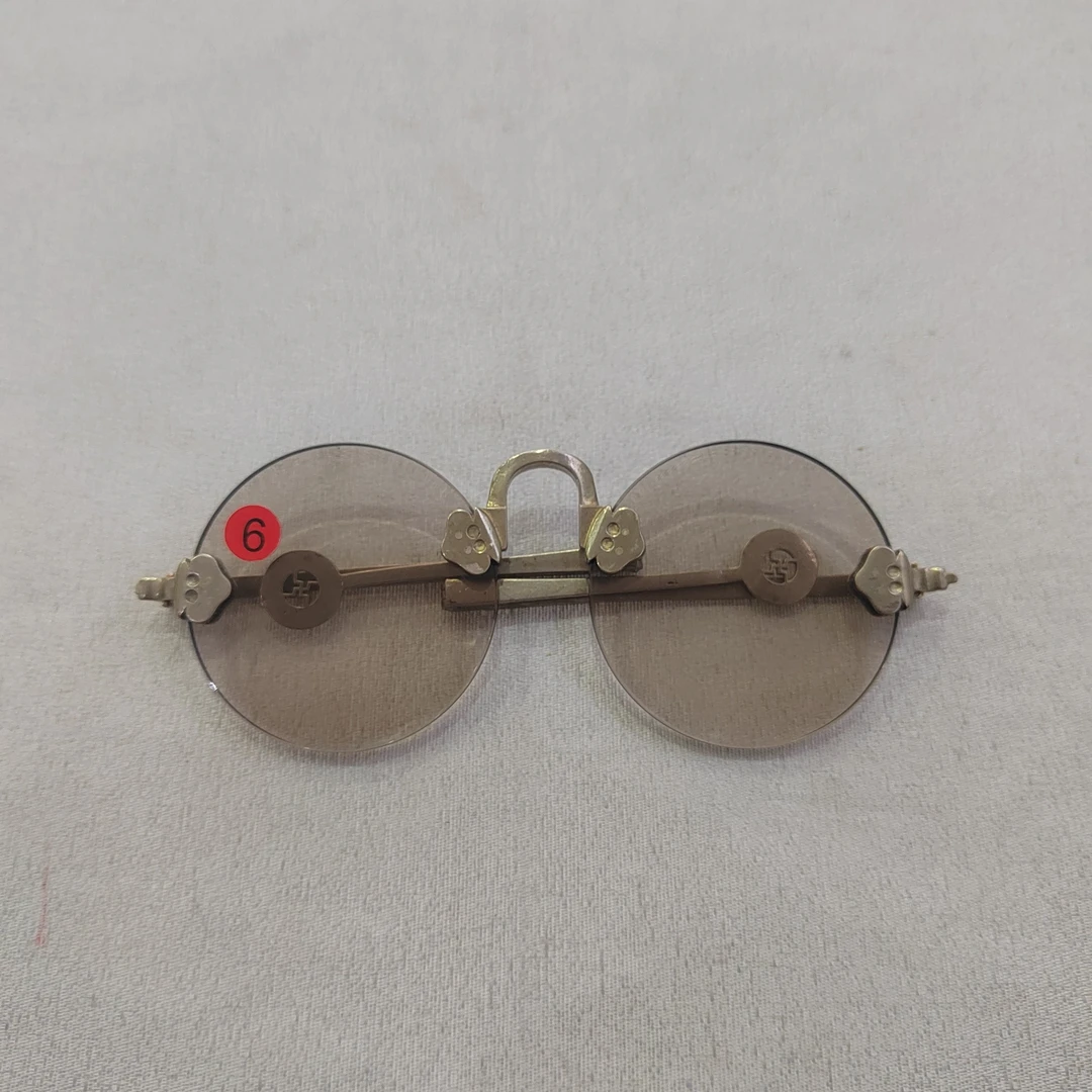 淡茶色精品眼镜，尺寸5..4cm镜片厚度3.8mm