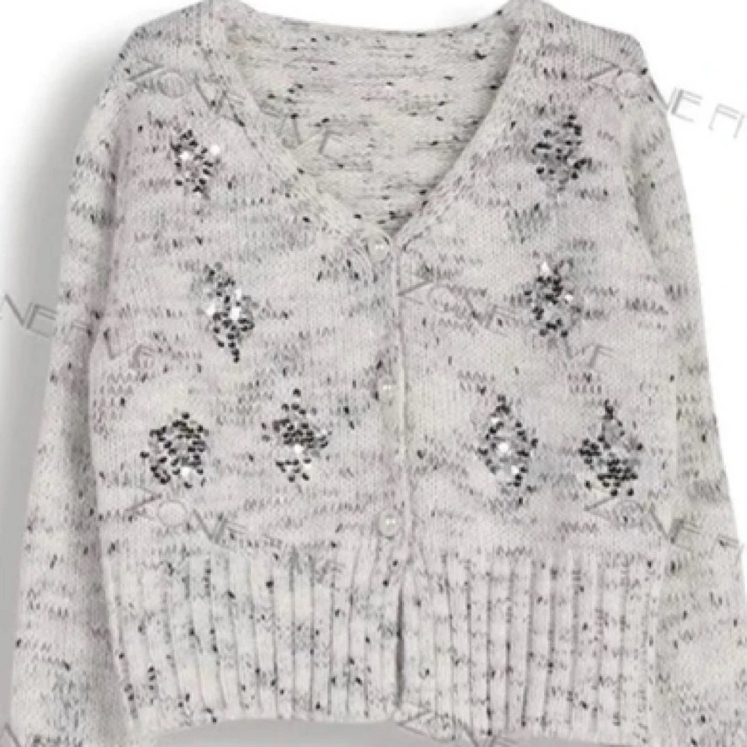 2025年啄木鸟法式亮片针织v领开衫女新款气质慵懒短款时尚毛衣
