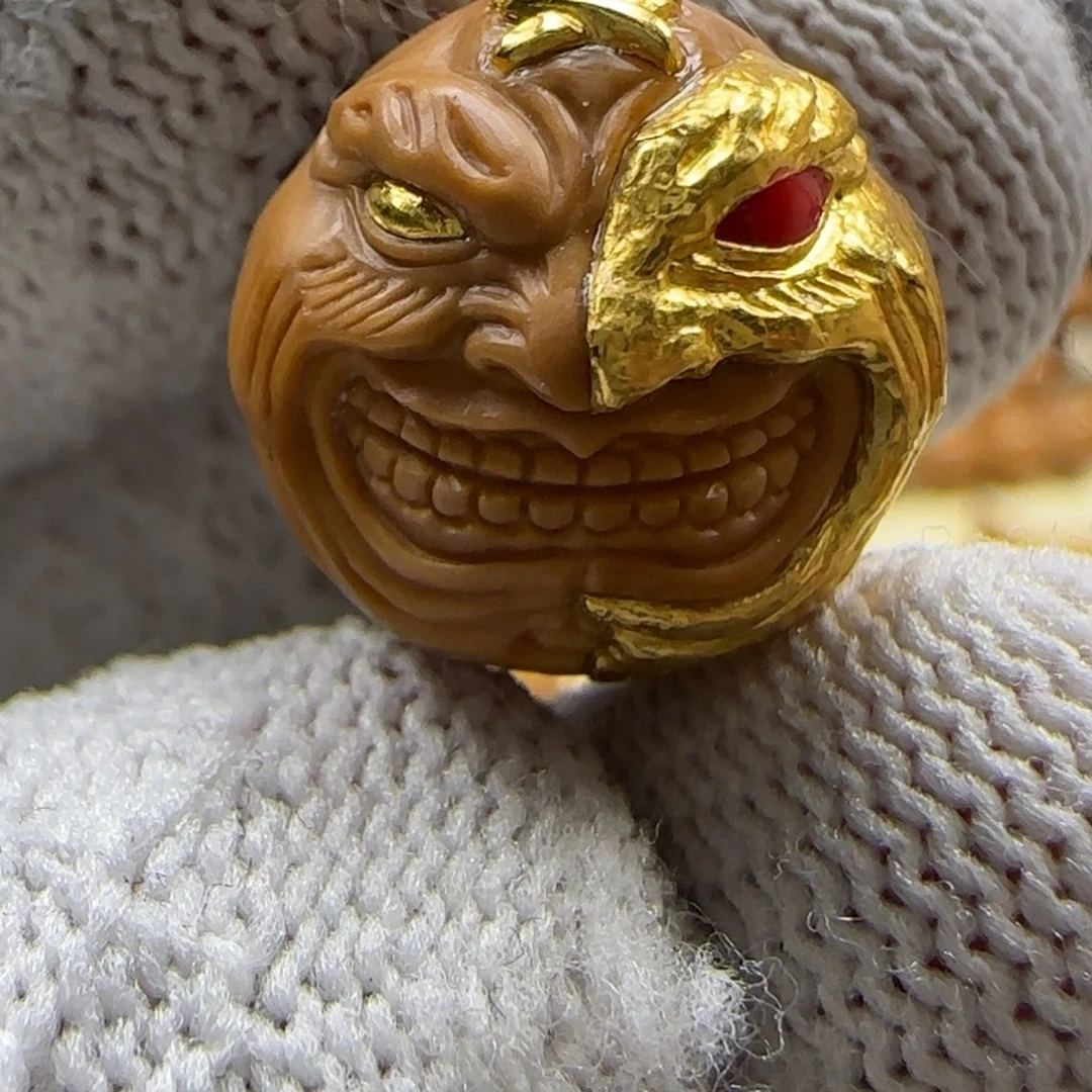 吊坠猴头核桃金面镶嵌24k