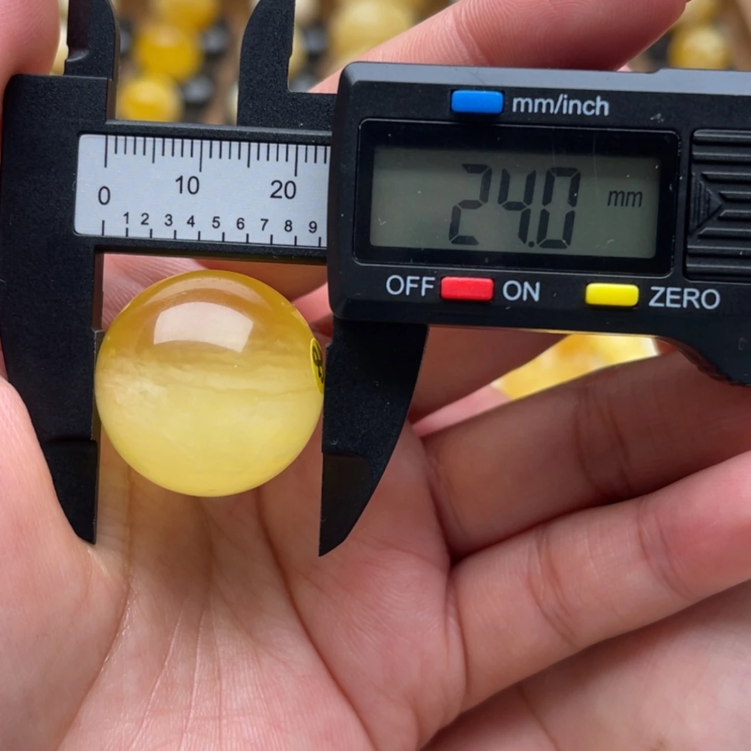 琥珀未镶嵌裸石蜜蜡圆珠笑