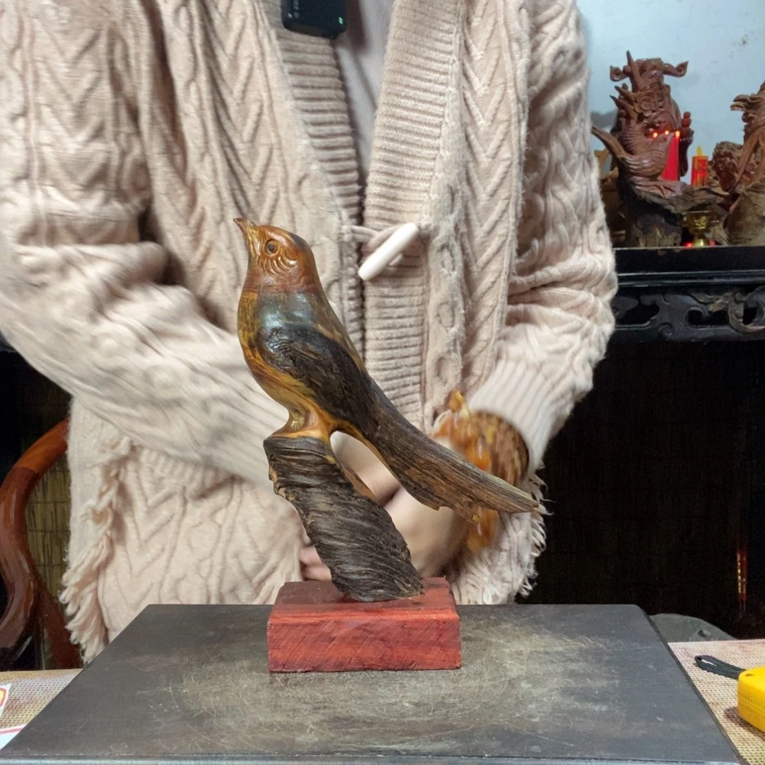 张***攀香榧木琥珀木报喜鸟