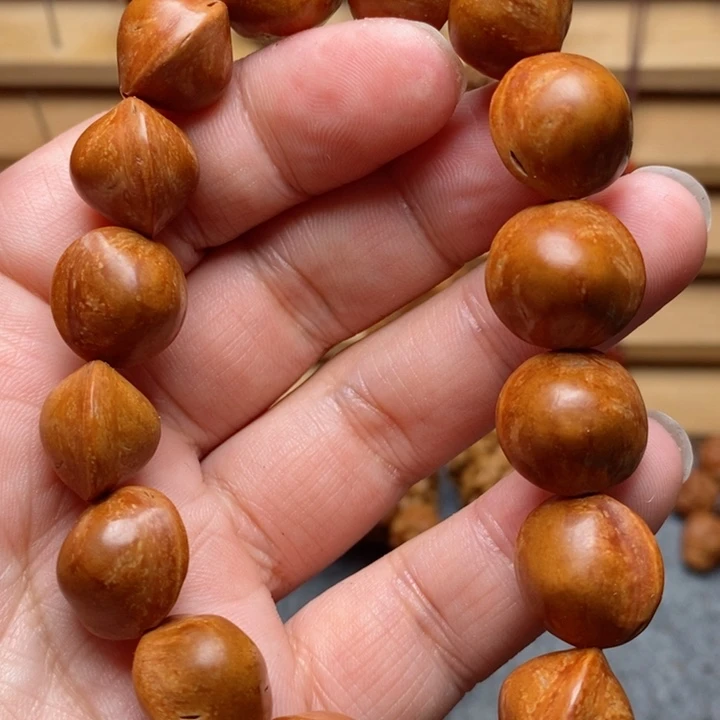 桃核雕刻素核手串