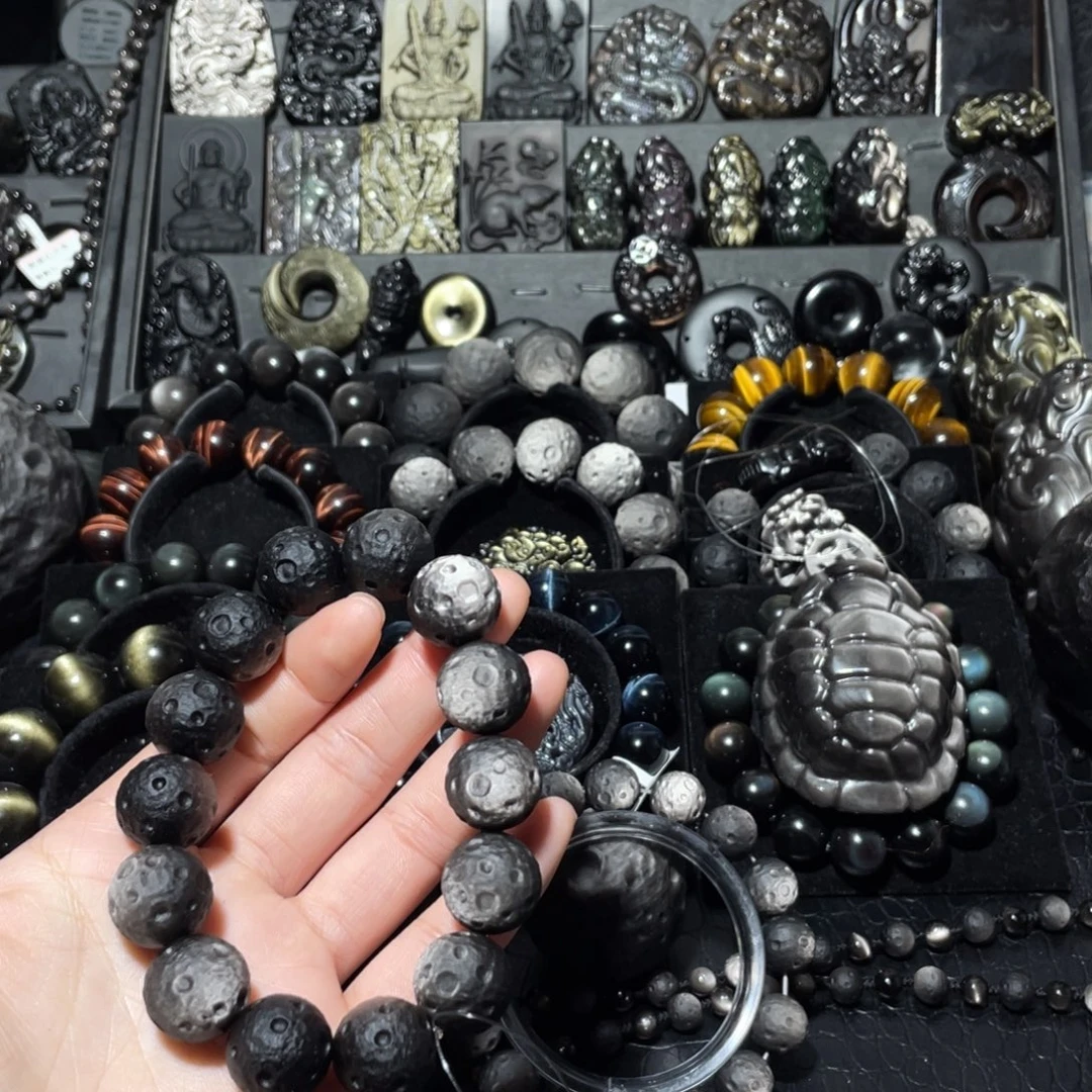 茉***施黑曜岩未镶嵌珠宝奇石