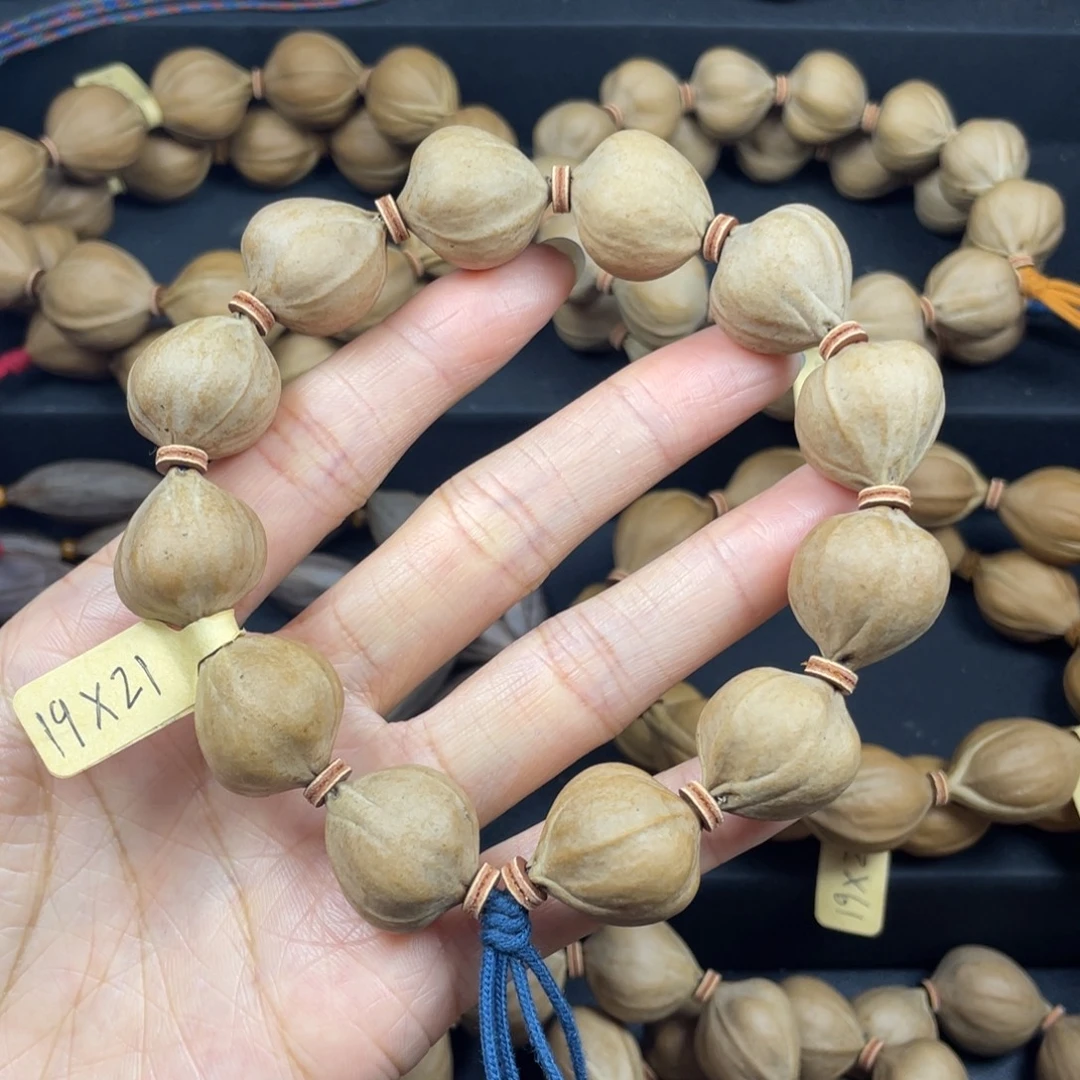 004橄榄核三花蒜头19*21