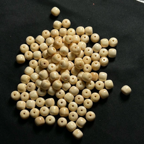 P016 老型皮桶珠 只做天然猛犸牙 约珠径7*对孔6mm 孔道1.5mm