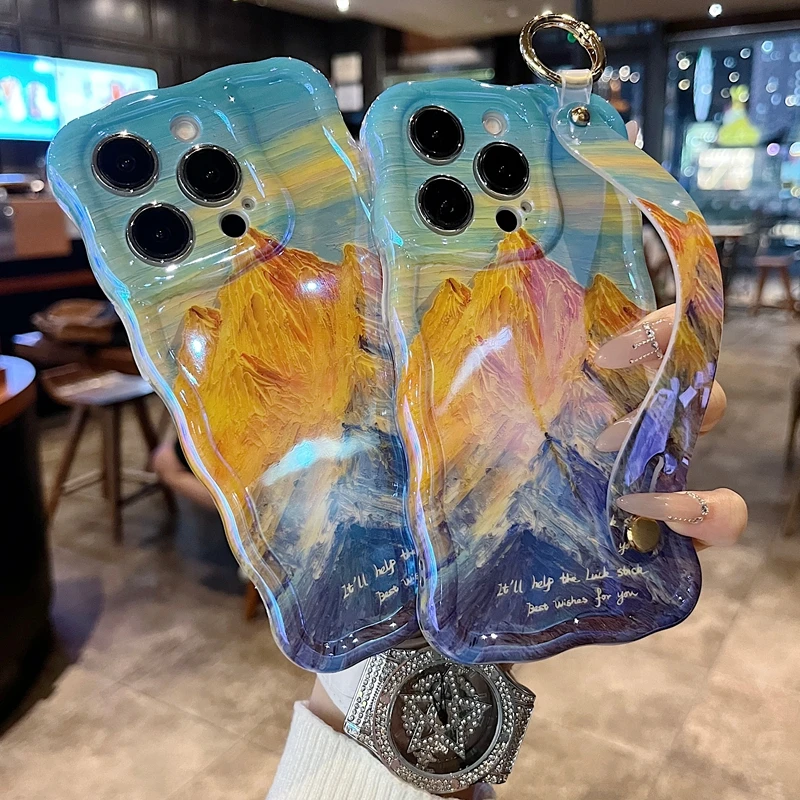 适用苹果系列iPhone16新款手机壳时尚日照金山精孔腕带支架扭扭边