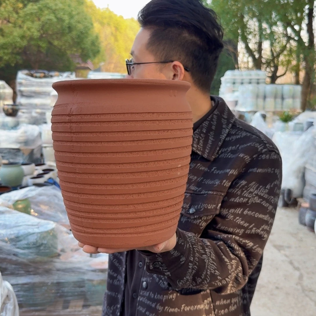 紫砂花盆口21高24（一个红陶