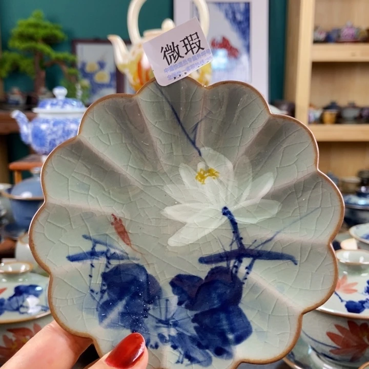 瓷片手工制作工艺精湛等特点为