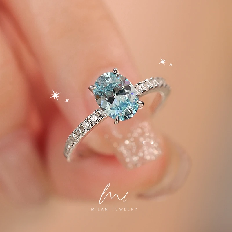 秘蓝 925银合成锆石戒指 海蓝色鸽子蛋戒指/椭圆小众轻奢款时尚戒