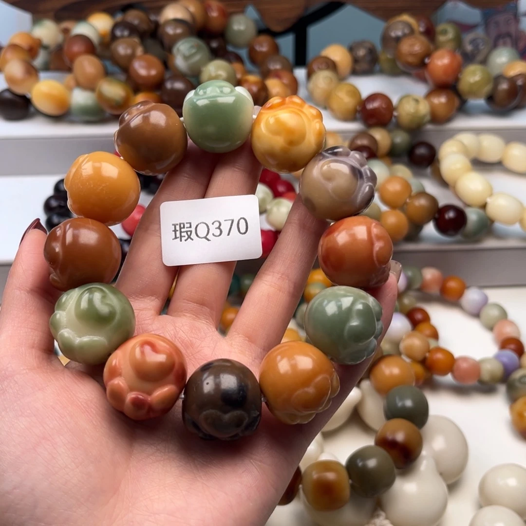 菩提根/象牙果手串用****022mm瑕爱心猫爪一串q370