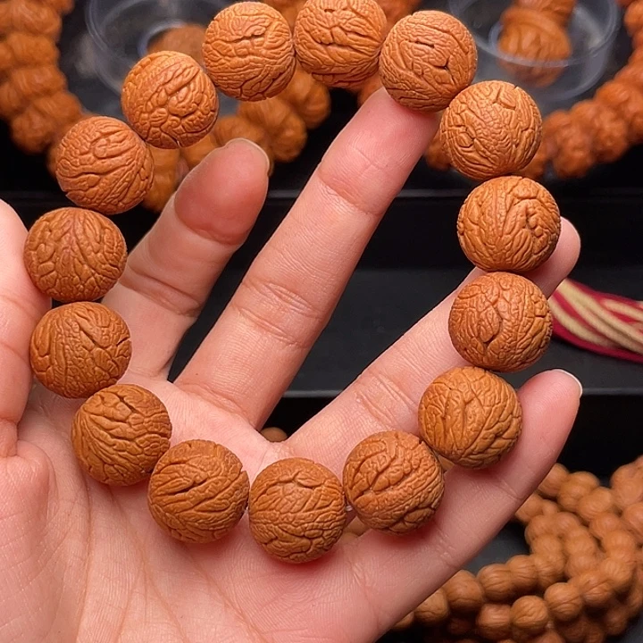 手串桃核金丝龙珠1.6