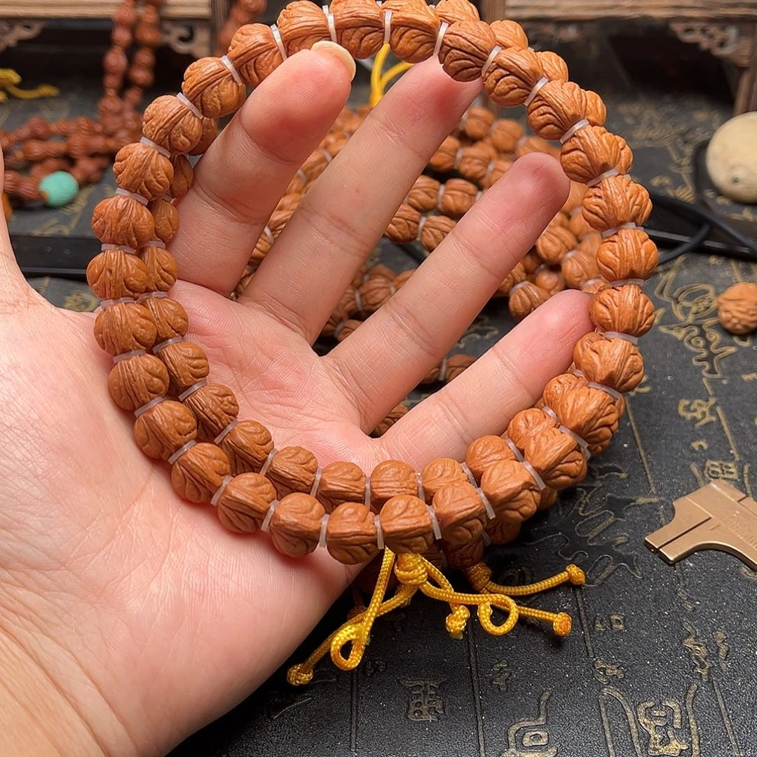 桃核吊坠玉龙手持