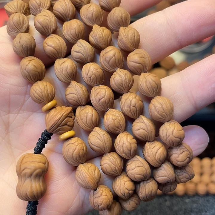 ****把件桃核小龙纹脖挂8.8尺寸115颗