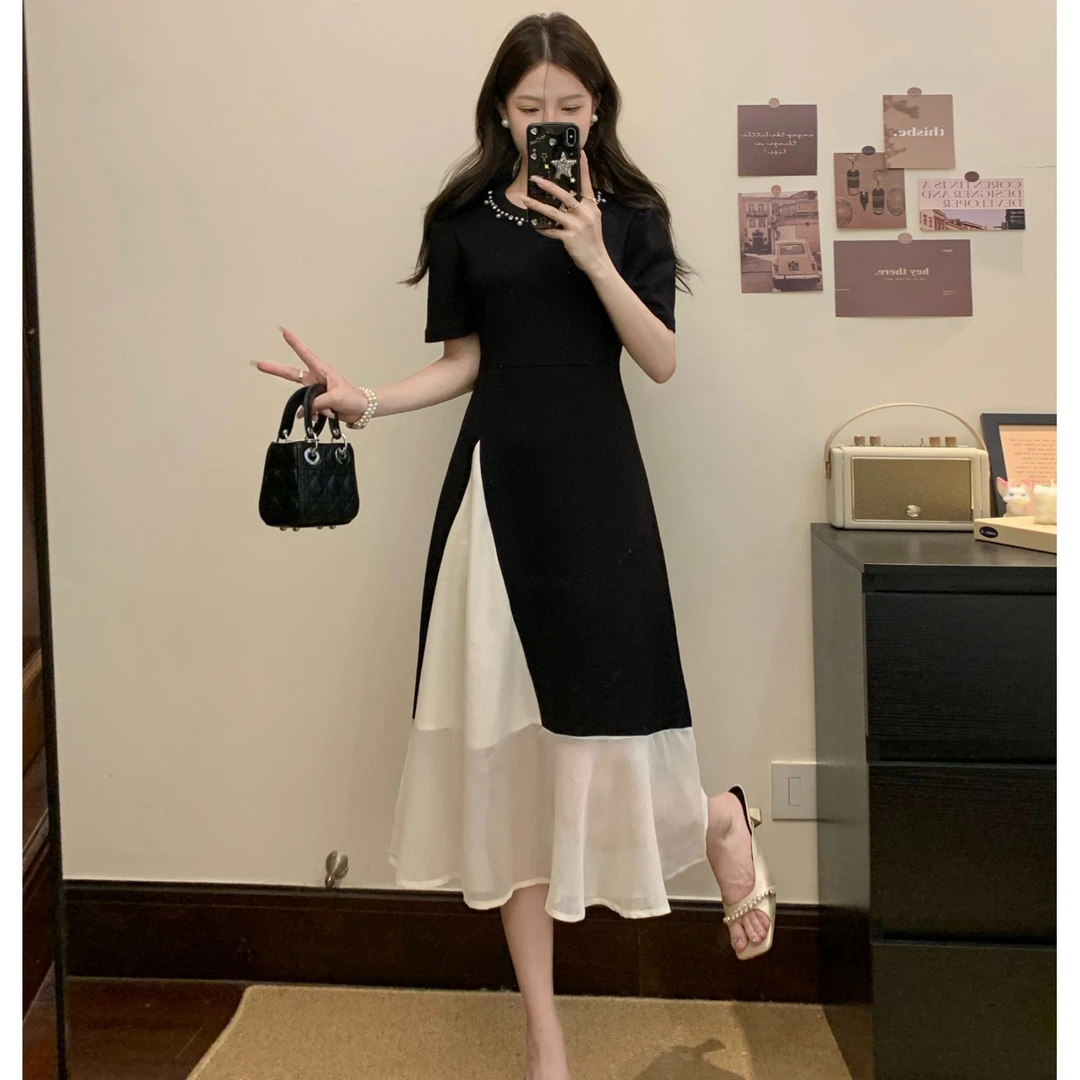 胖妹妹大码法式假俩件蝴蝶结夏季新款不规则重工钉珠拼接连衣裙