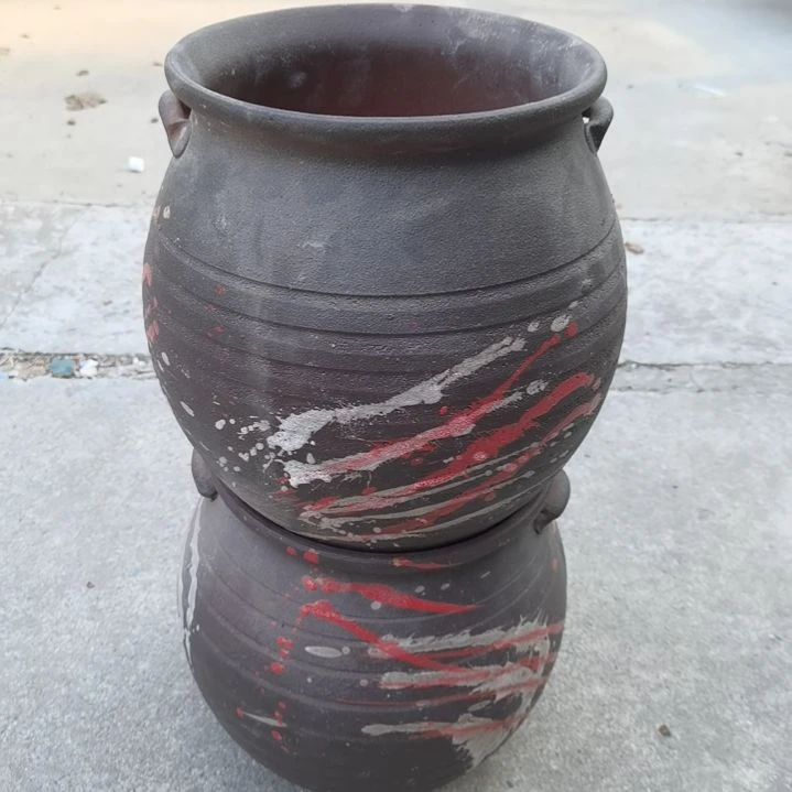 红陶江****姐瑕疵两个盆子