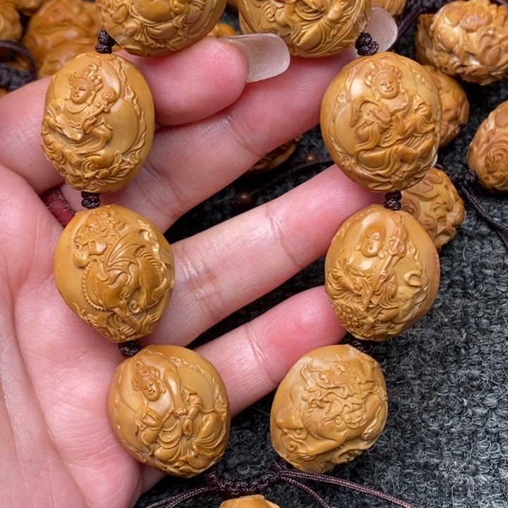 吊坠橄榄核好可怜咯啦啦咯啦咯啦啦啦