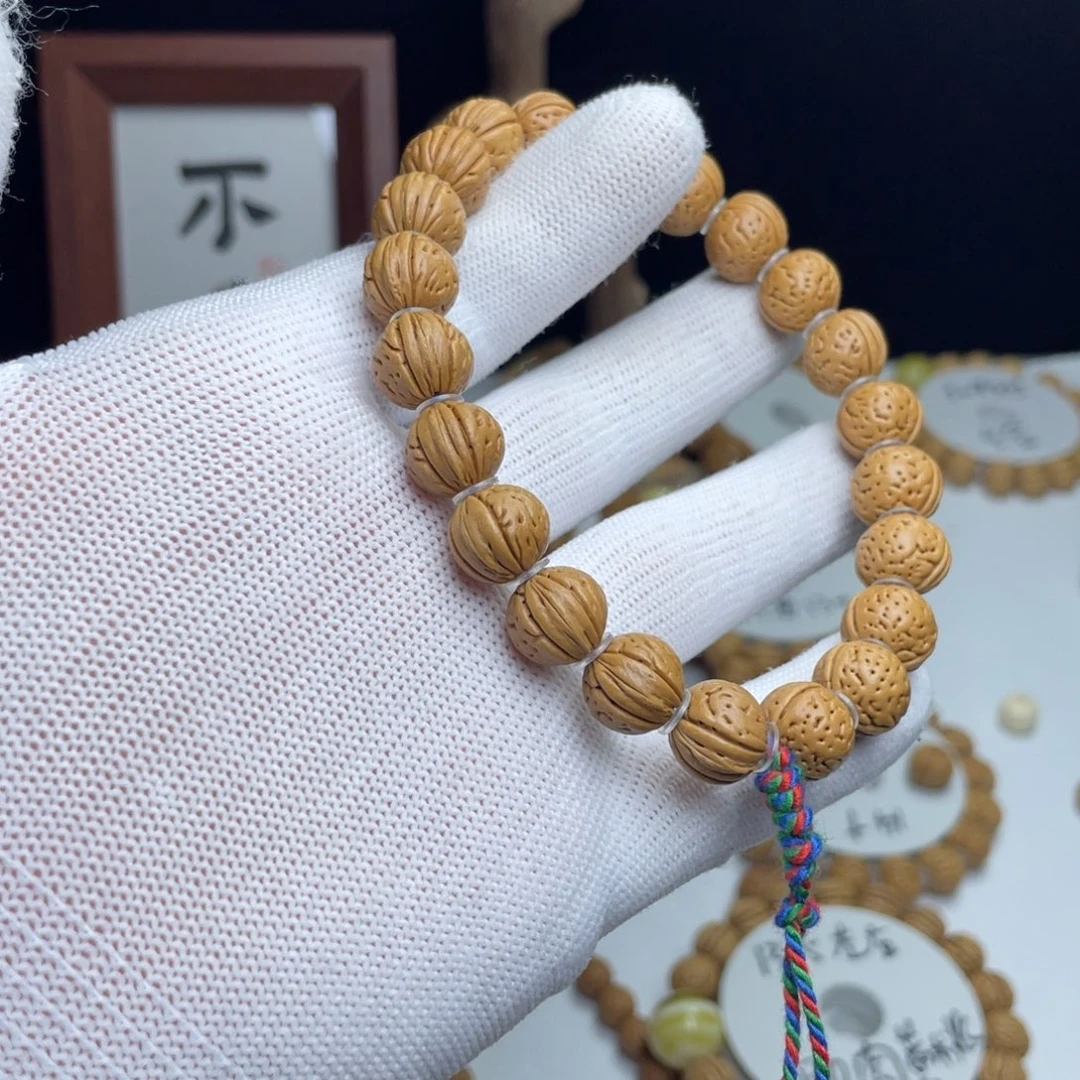 桃核手串1*3野生脐中脐小黄桃 12+