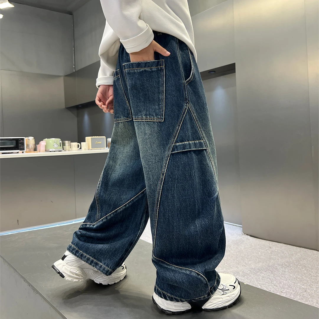 男童深蓝拼接弯刀牛仔裤春秋潮款2025儿童复古休闲直筒裤子中大童