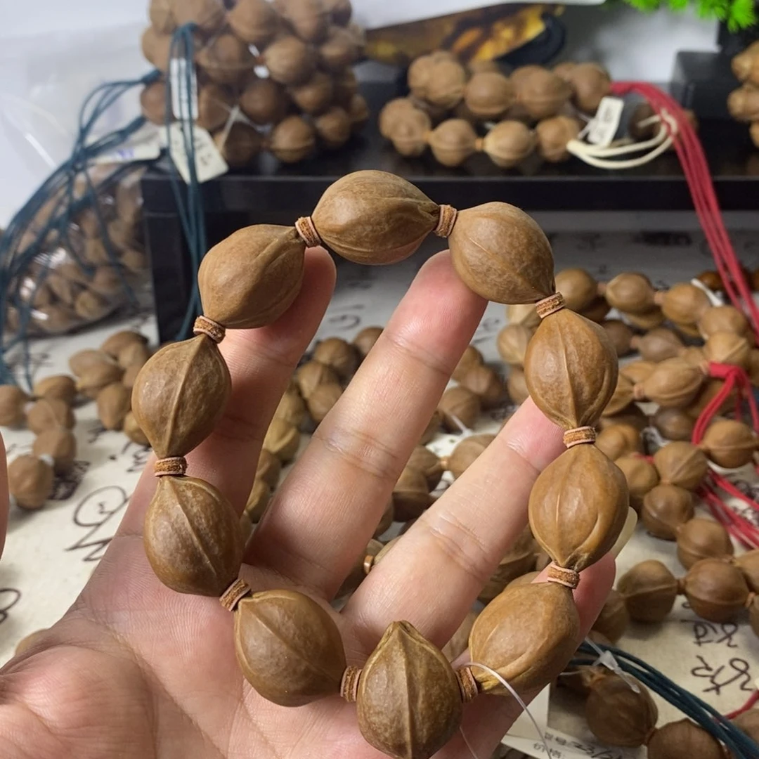 朱***义橄榄核手串2027梅林铁核