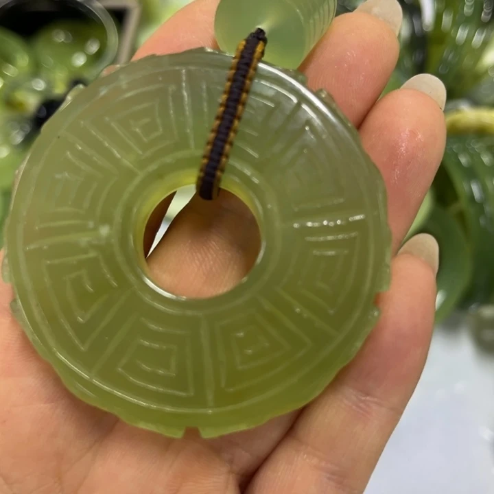蛇纹石玉合金吊坠包*欠