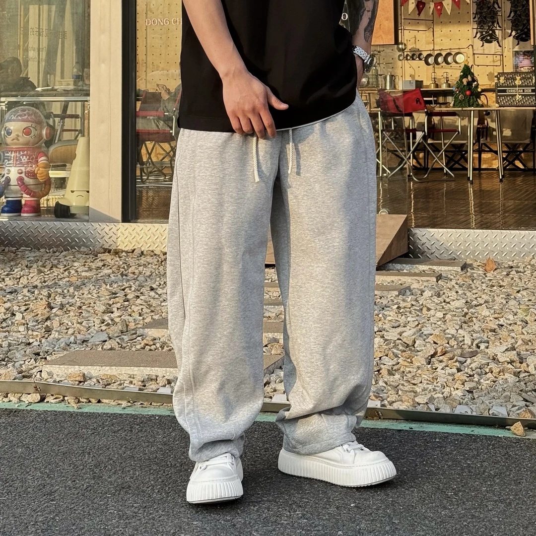 鹏仔春季新款分层弯刀剪裁设计极简宽松卫裤