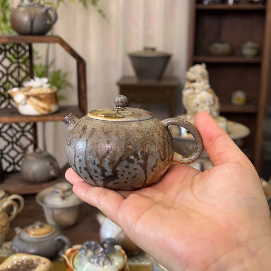 23中白重落灰西施壶