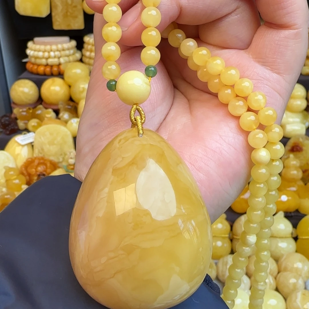 琥珀未镶嵌套链天然俄料浓蜡妖花蜜蜡水滴吊坠
